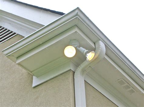 exterior round junction box for flood light eave moutned|installing flood lights vinyl soffit.